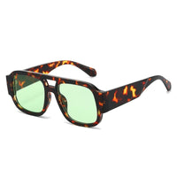 Tortoiseshell frame + green lens